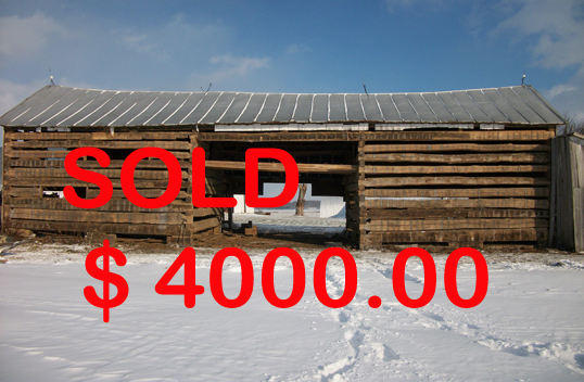 Double Pen Cabin with log center wall.
