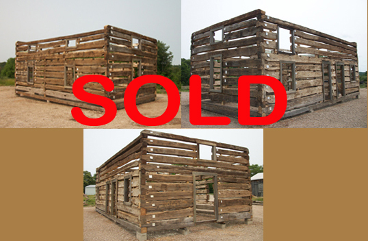 Double Pen Cabin with log center wall.